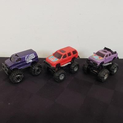 LOT 155: Collection of Monster Trucks-Matchbox Sized
