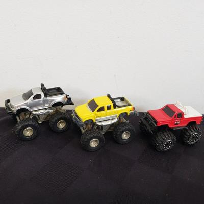 LOT 155: Collection of Monster Trucks-Matchbox Sized