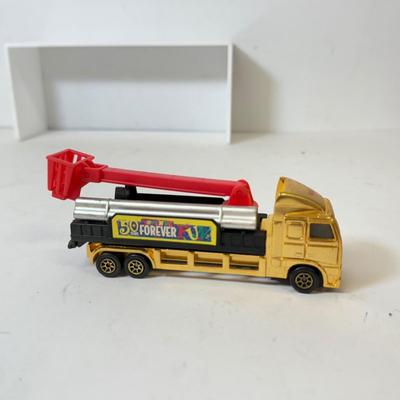 LOT 201: Toys R Us Trucks / Collectibles & More