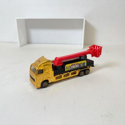 LOT 201: Toys R Us Trucks / Collectibles & More