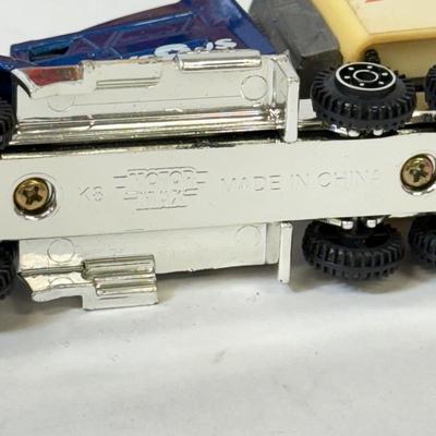 LOT 201: Toys R Us Trucks / Collectibles & More
