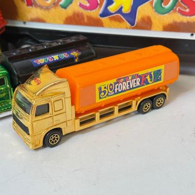 LOT 201: Toys R Us Trucks / Collectibles & More