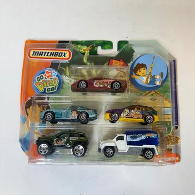 LOT 202: Toys R Us Trucks & Matchbox: Spongebob & Go Diego Go