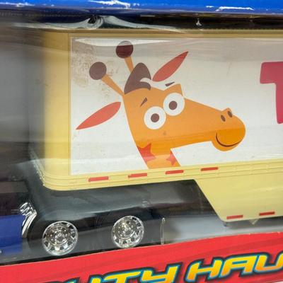 LOT 202: Toys R Us Trucks & Matchbox: Spongebob & Go Diego Go