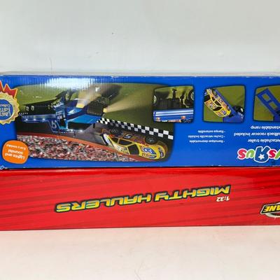 LOT 202: Toys R Us Trucks & Matchbox: Spongebob & Go Diego Go