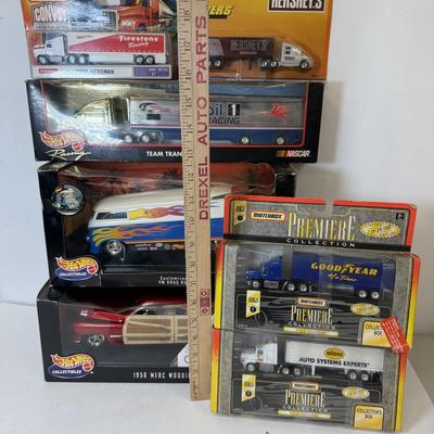 LOT 205: Hot Wheels Collectibles in Box & Matchbox Trucks in Package