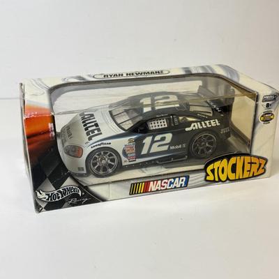 LOT 207: NASCAR Stockers, Racing Champions in Package, Matchbox Convoys & More
