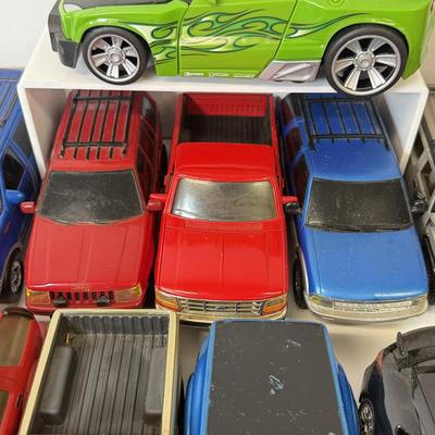 LOT 212: Die Cast Family Vehicles & More