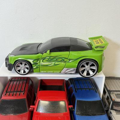 LOT 212: Die Cast Family Vehicles & More