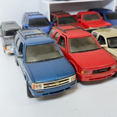 LOT 212: Die Cast Family Vehicles & More