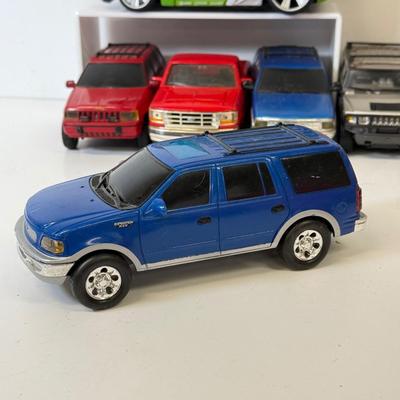 LOT 212: Die Cast Family Vehicles & More