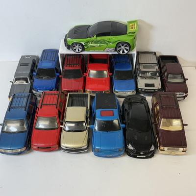LOT 212: Die Cast Family Vehicles & More