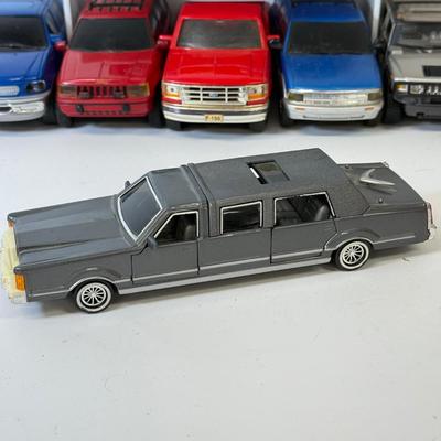 LOT 212: Die Cast Family Vehicles & More