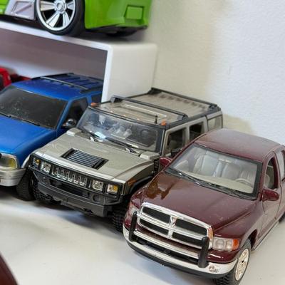 LOT 212: Die Cast Family Vehicles & More