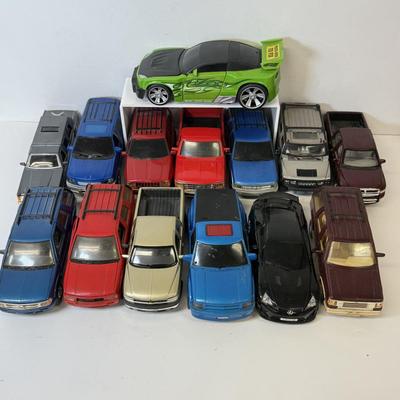 LOT 212: Die Cast Family Vehicles & More