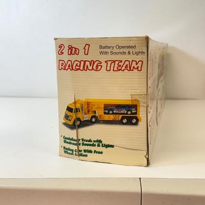 LOT 213: Large Kawasaki Racing Trailer, 1994 Nascar Fun Saver in Box & More