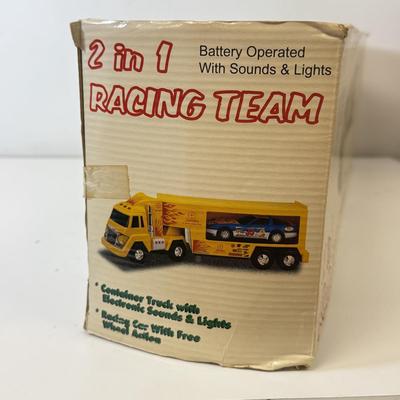 LOT 213: Large Kawasaki Racing Trailer, 1994 Nascar Fun Saver in Box & More