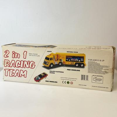 LOT 213: Large Kawasaki Racing Trailer, 1994 Nascar Fun Saver in Box & More