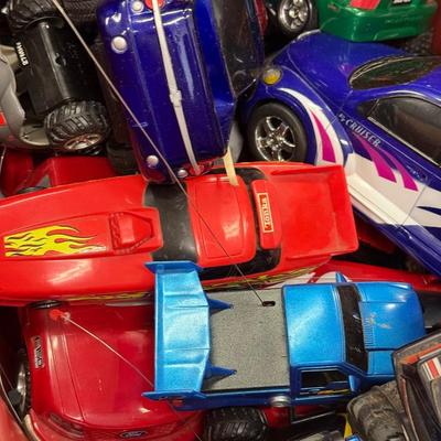 LOT 216: 40 Gallon Tub of Radio Control RC Cars & Remotes
