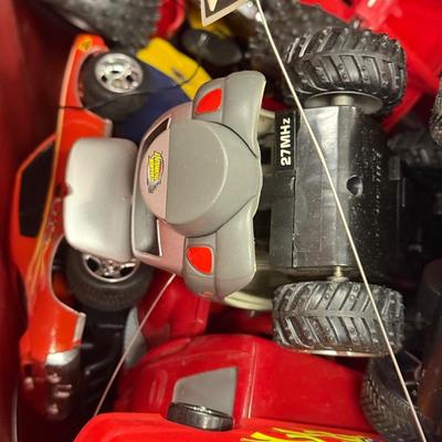 LOT 216: 40 Gallon Tub of Radio Control RC Cars & Remotes