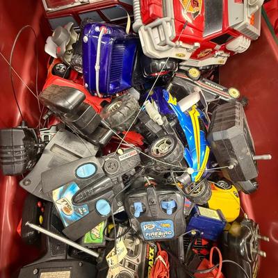 LOT 216: 40 Gallon Tub of Radio Control RC Cars & Remotes
