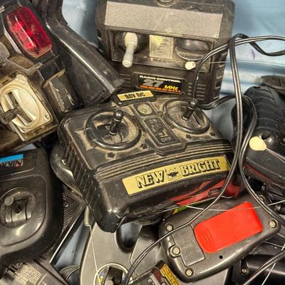 LOT 216: 40 Gallon Tub of Radio Control RC Cars & Remotes