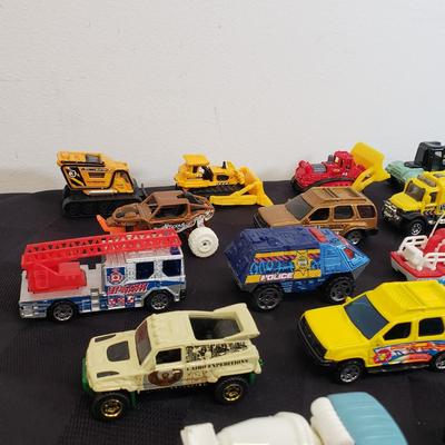 LOT 222: Assortment of Specialty Cars & Trucks with Boats-Matchbox, Hot Wheels & More