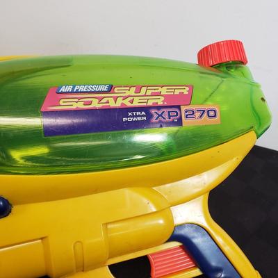LOT 224: Vintage Larami Super Soakers with Assortment of Target Boards