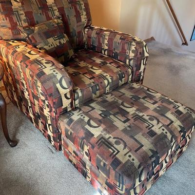 2 decorative chairs and ottomans