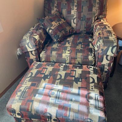 2 decorative chairs and ottomans