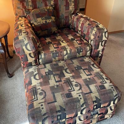 2 decorative chairs and ottomans