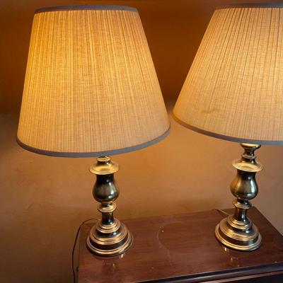 2 brass lamps