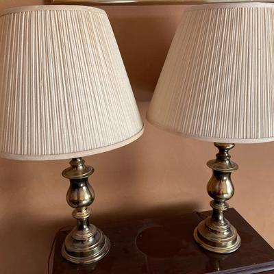 2 brass lamps