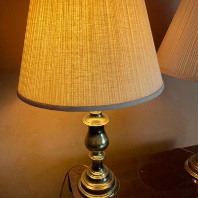 2 brass lamps