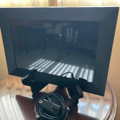 Small round table with digital photo frame
