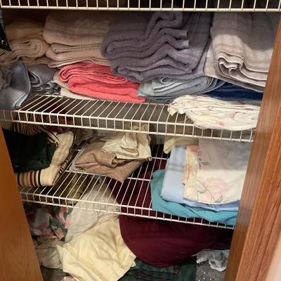 Closet full of towels and some sheets