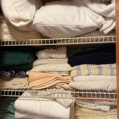 Closet full of towels and some sheets