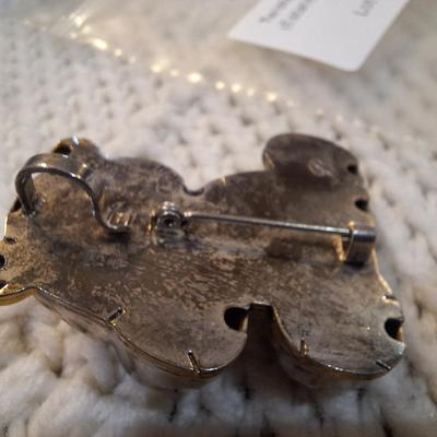 Sale Photo Thumbnail #216: silver tone bear brooch signed Best