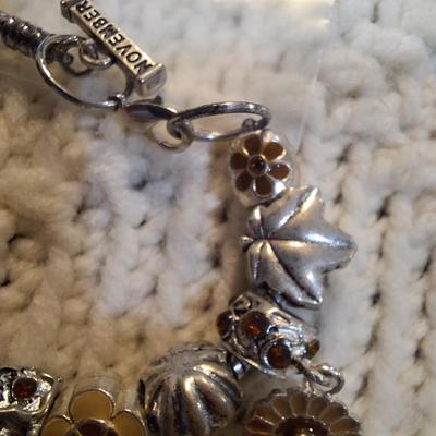 Sale Photo Thumbnail #298: November story line bracelet with charms