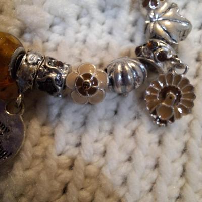 Sale Photo Thumbnail #299: November story line bracelet with charms