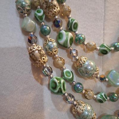 Sale Photo Thumbnail #365: multi strand green and gold tone beaded necklace