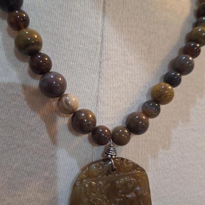 Sale Photo Thumbnail #374: Brown beaded necklace with large pendant - clasp is marked 925