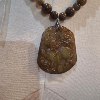 Sale Photo Thumbnail #373: Brown beaded necklace with large pendant - clasp is marked 925