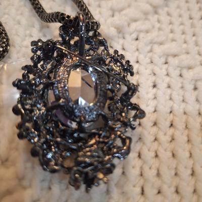 Sale Photo Thumbnail #406: Large statement pendant on blackish silver chain