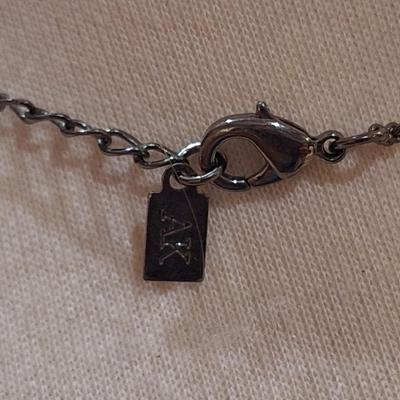 Sale Photo Thumbnail #413: Dainty black choker necklace marked AK (vintage Anne Klein?)