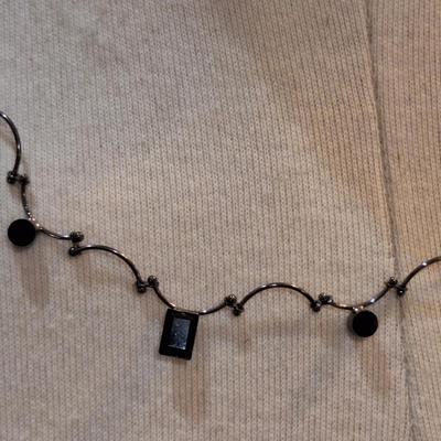 Sale Photo Thumbnail #412: Dainty black choker necklace marked AK (vintage Anne Klein?)