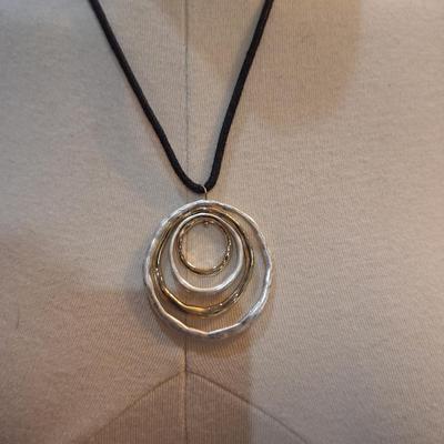Sale Photo Thumbnail #422: Necklace with pendant of large rings