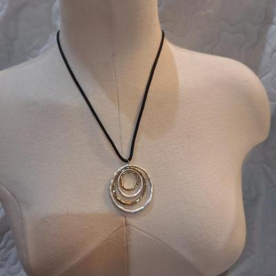 Sale Photo Thumbnail #420: Necklace with pendant of large rings