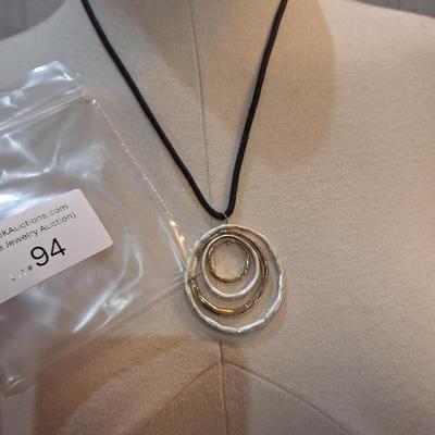 Sale Photo Thumbnail #421: Necklace with pendant of large rings
