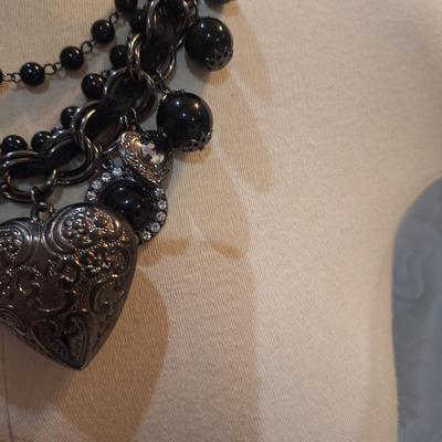 Sale Photo Thumbnail #428: Black charm necklace- hearts, cameo and other charms.